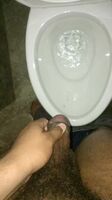 Taking a quick piss before bed with a massive hard-on
