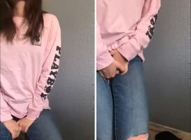 Holding on the left, letting go on the right in a pink sweater