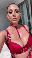 Angela white looking good in red outfit