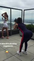 Jen Selter bending over while taking photos