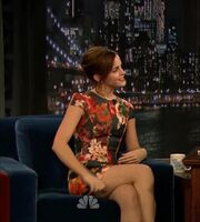 Emma Watson adjustes her dress to show us her little white panties