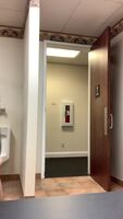 Restroom door completely open