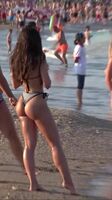 Caught Filming On The Beach