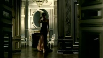 Charlize Theron stripping in a Dior commercial