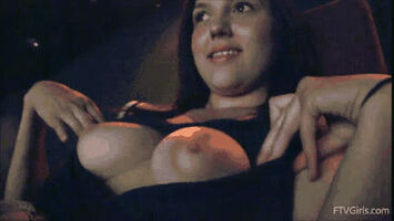 Teen Plays with her nipples during movie