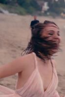 Natalie Portman bouncing at the beach