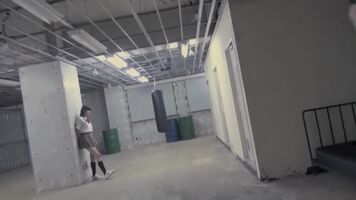 2 students tongue kiss in abandoned warehouse