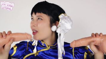 Chun li from Street fighter takes on two cocks like a true slut!