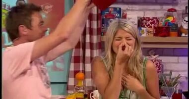 Holly Willoughby gets stinky beans dumped on her